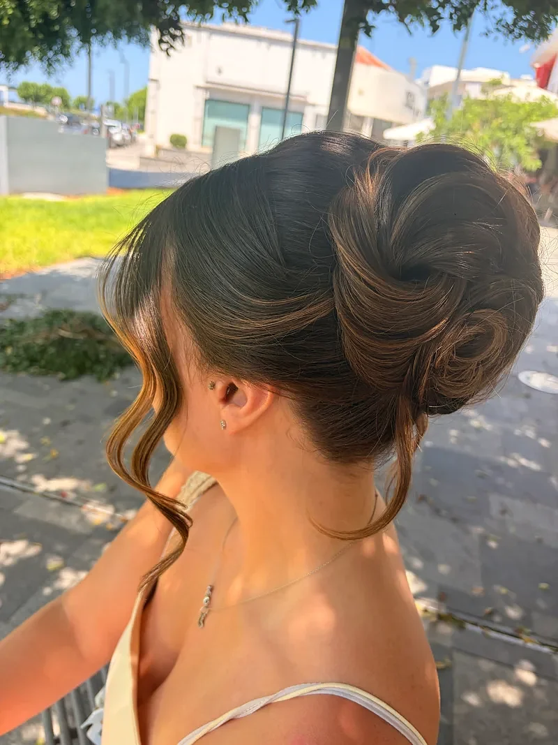 Occasion updo with a high bun